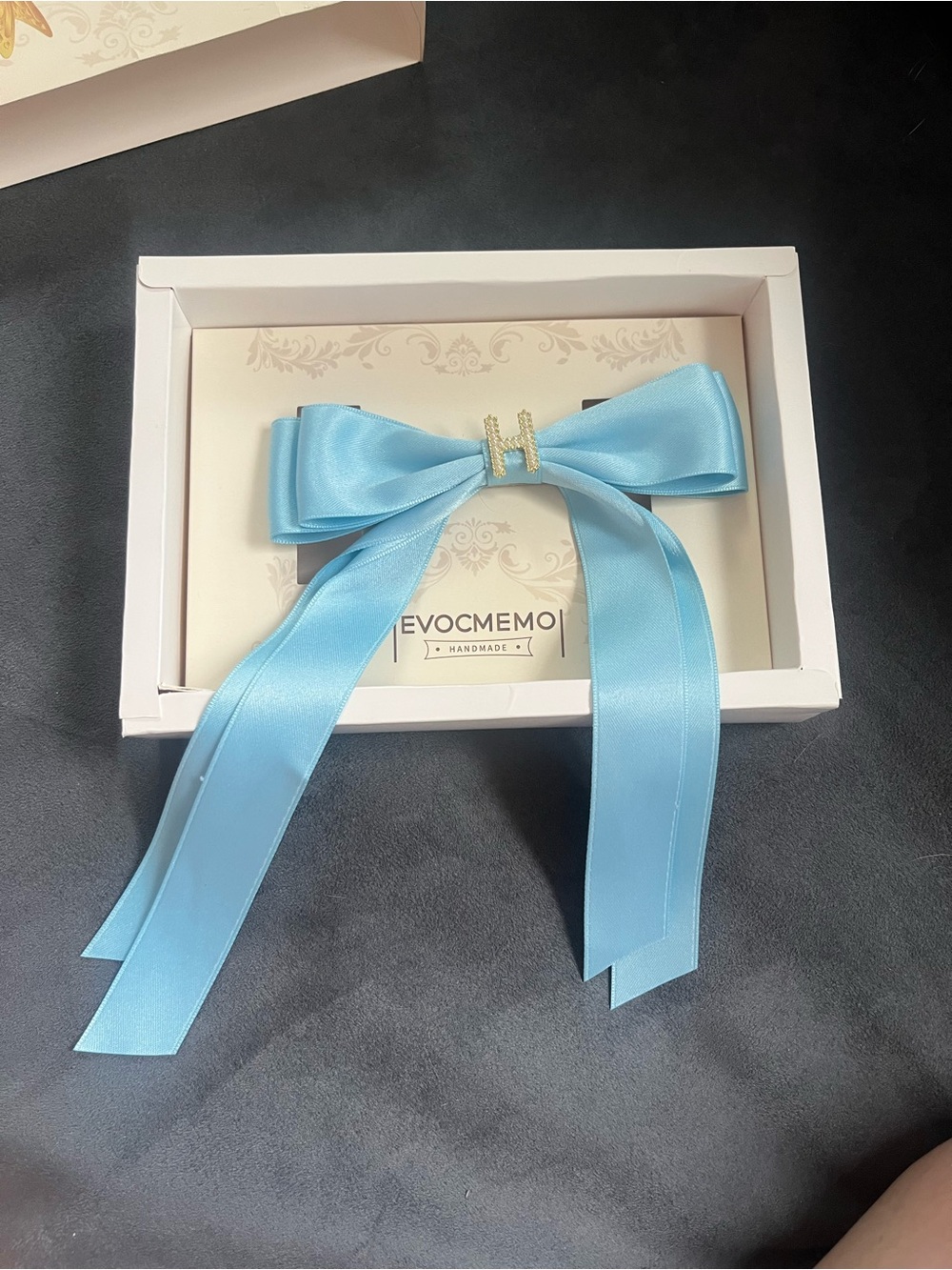 Light Blue Satin Bow Hair Clip with Gold 'H' Accent